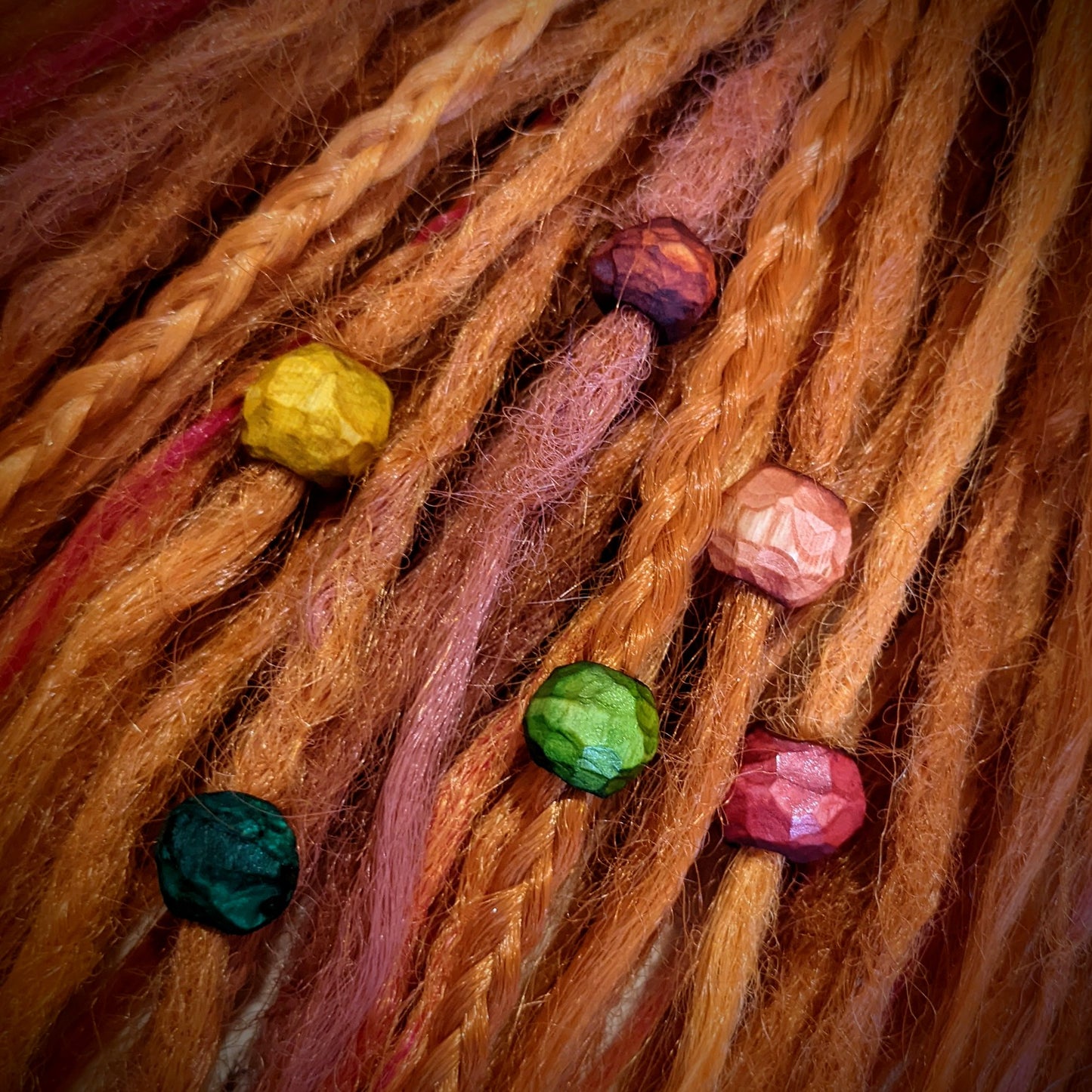 Carved twig beads for dreadlocks