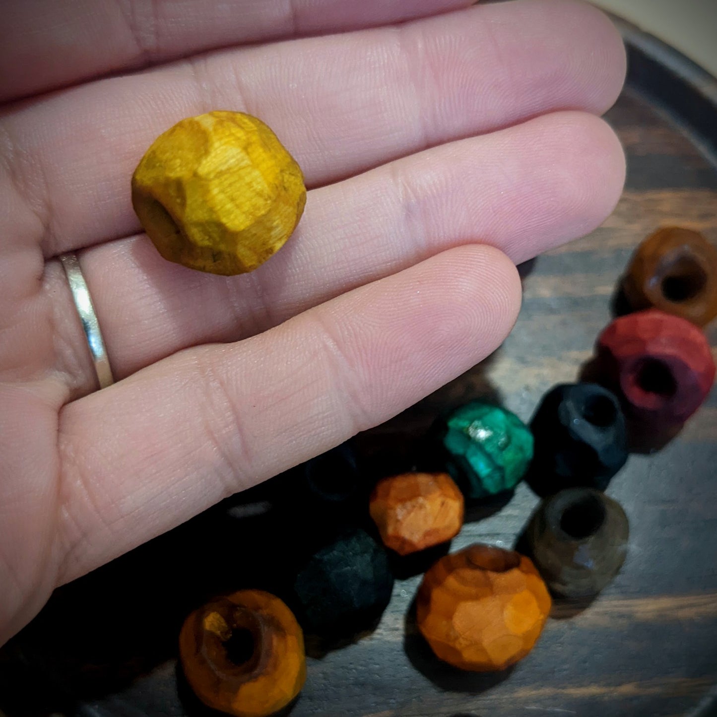 Carved twig beads for dreadlocks