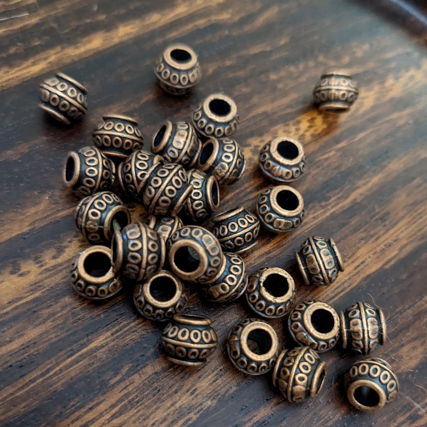 Metal polka dot beads