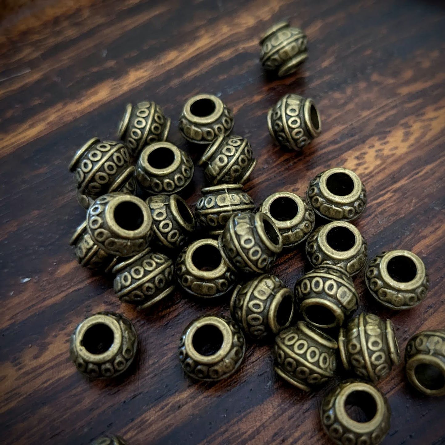 Metal polka dot beads