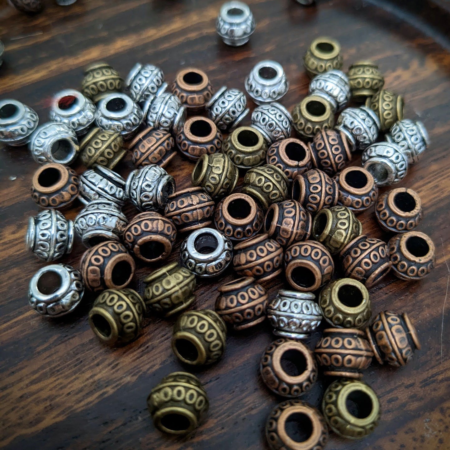 Metal polka dot beads