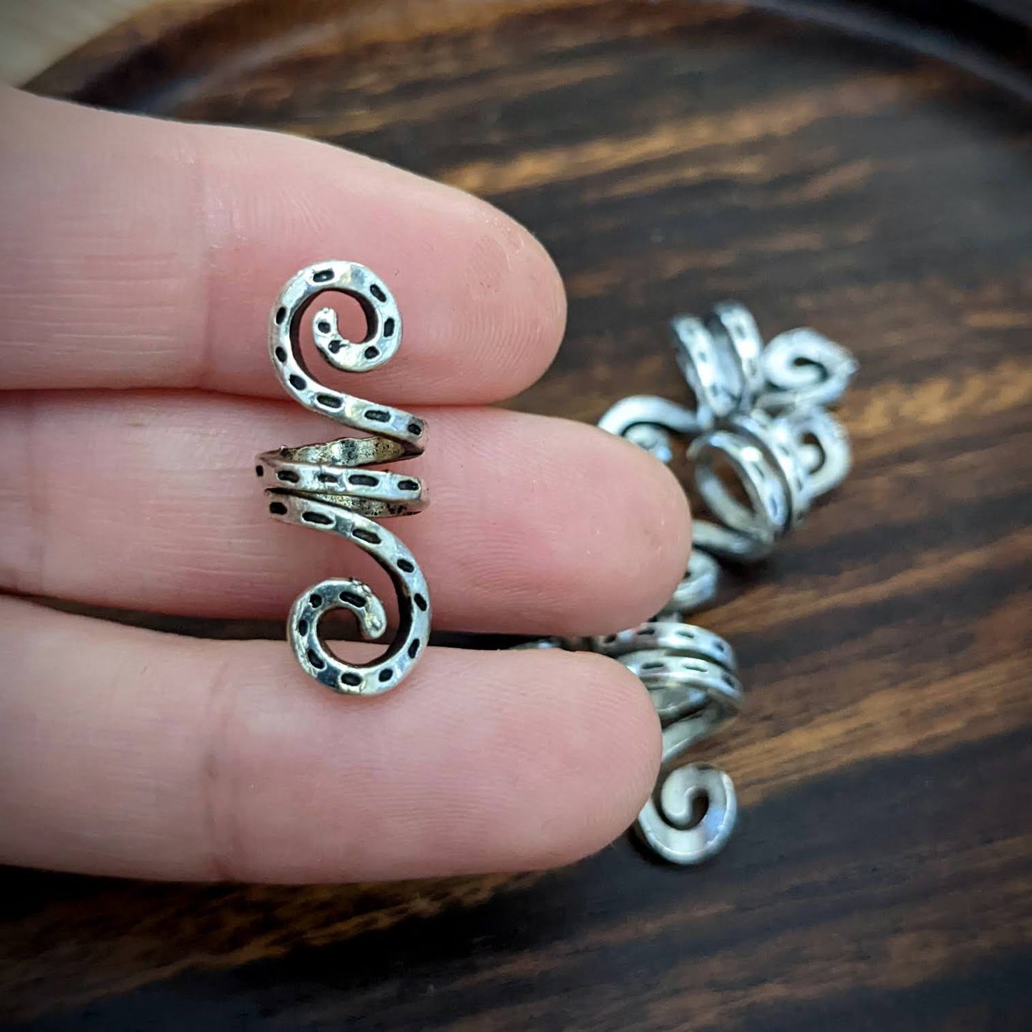 Metal double spiral beads