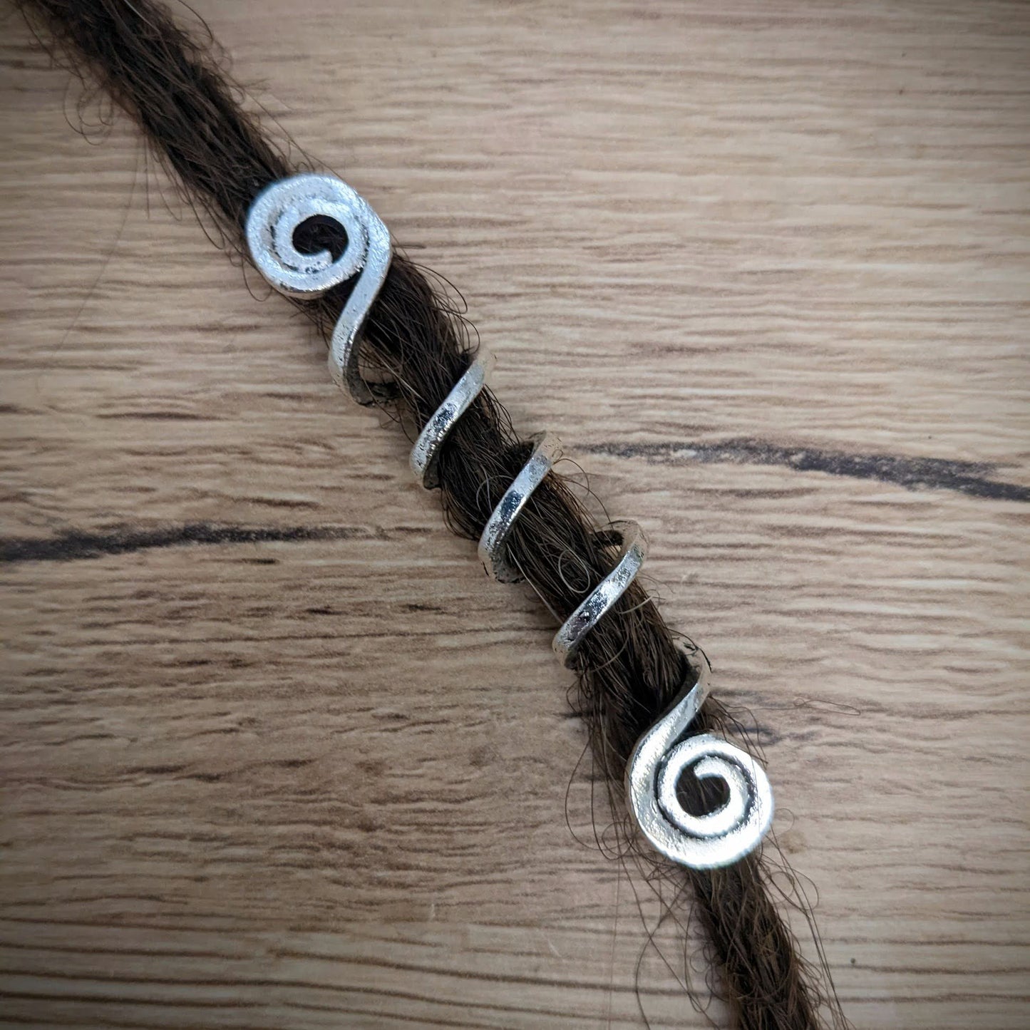 Long metal spiral beads