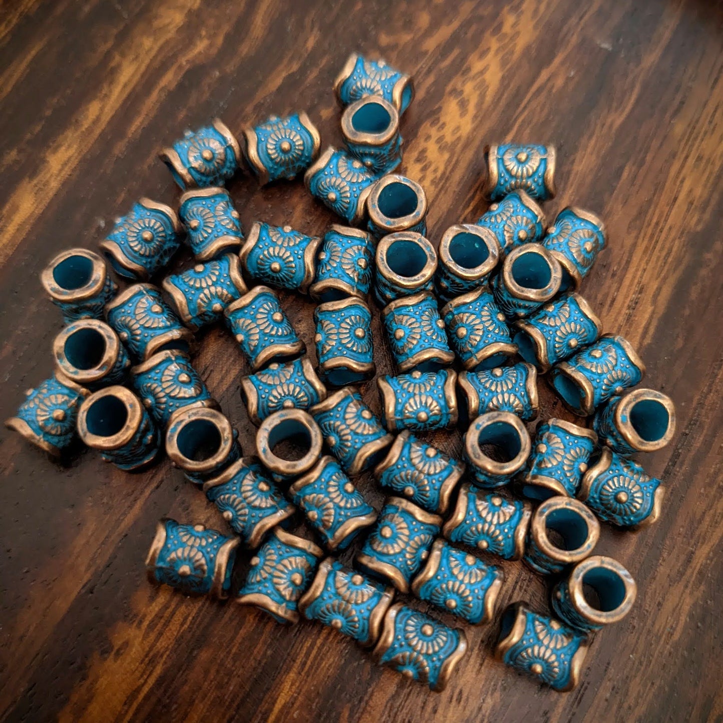 Metal copper beads with patina shields