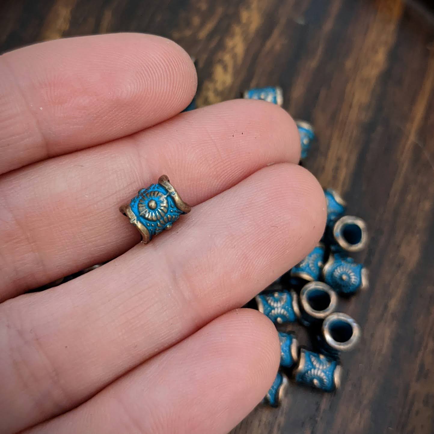 Metal copper beads with patina shields