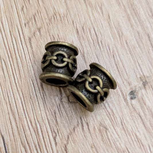 Metal beads with ornament (brass)