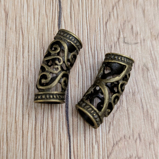 Metal beads with ornament (brass)
