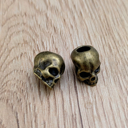 Metal beads with ornament (brass)